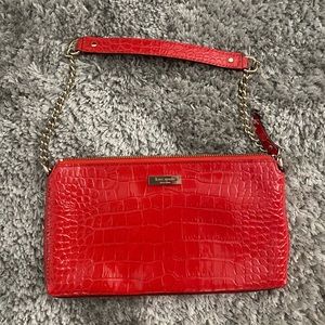 Kate Spade, New York, new without tags red purse.Dust bag.